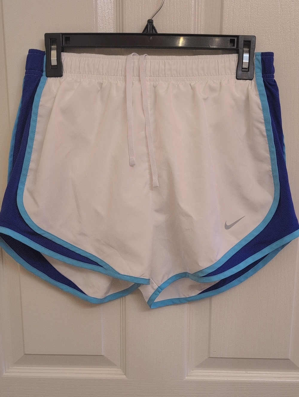 Nike Women’s White Athletic Shorts with Blue and Light Blue Trim